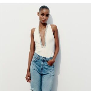 Zara embellishment body/top.
New with tags
Size xs